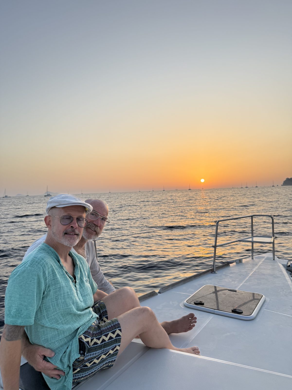 Sunset catamaran cruise across the Cyclades