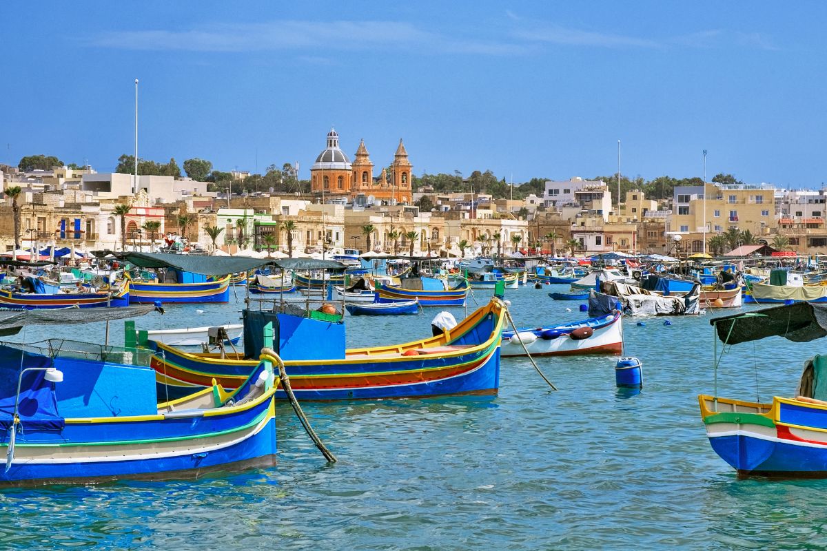 Colourful fishing boats in Marsaxlokk harbour, Malta