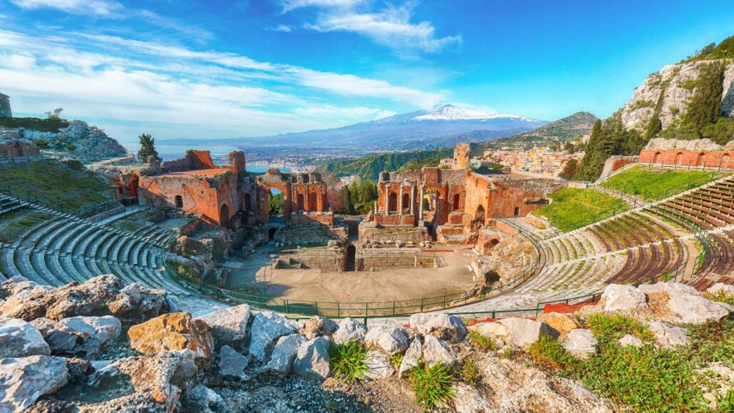 Gay couple's view over Taormina and the Ionian Sea, Sicily