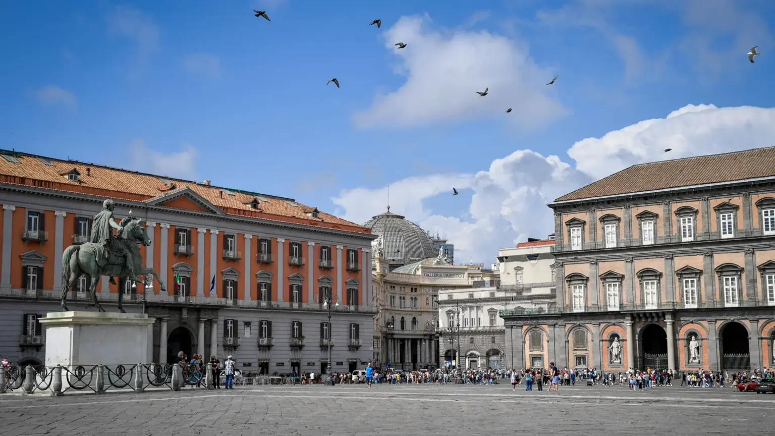 Piazza del Plebiscito in Naples, with the Royal Palace and the dome of Galleria Umberto I